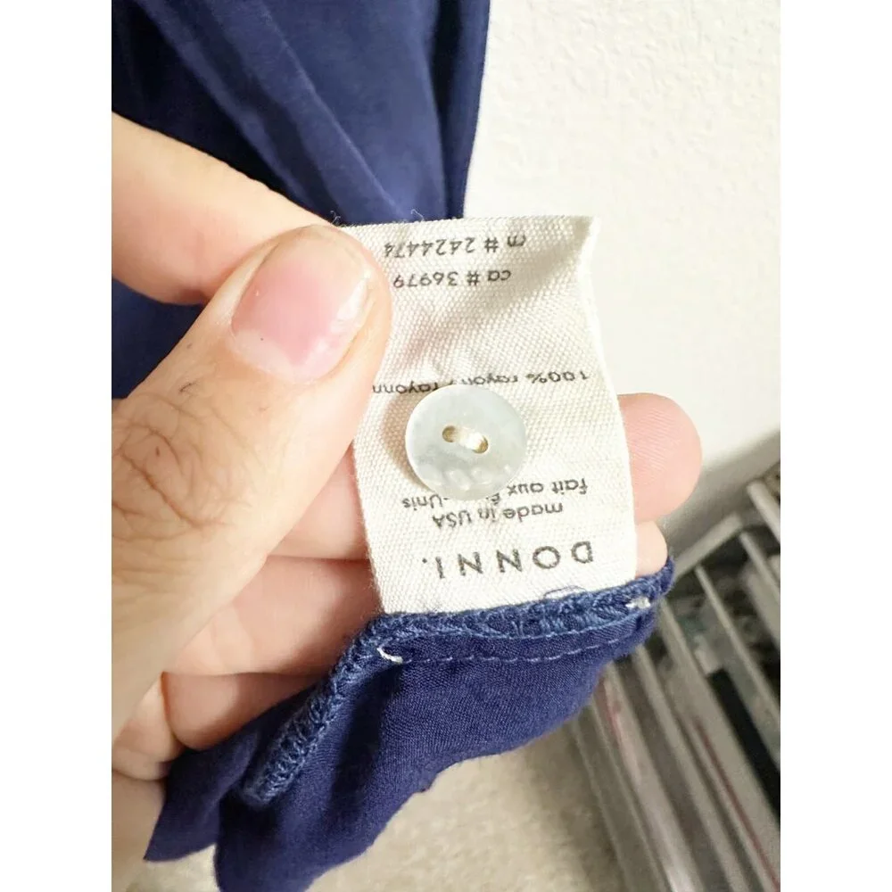 DONNI. pre owned